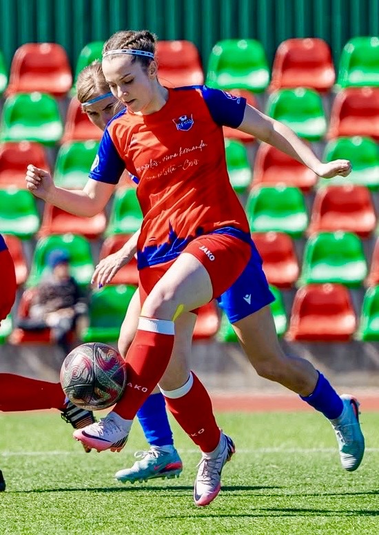 Karīna in action playing football for FK Cēsis